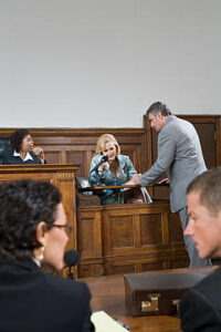 A lawyer questioning a witness