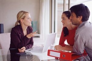 Couple meeting with a financial adviser