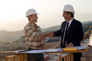 Architect and engineer on building site